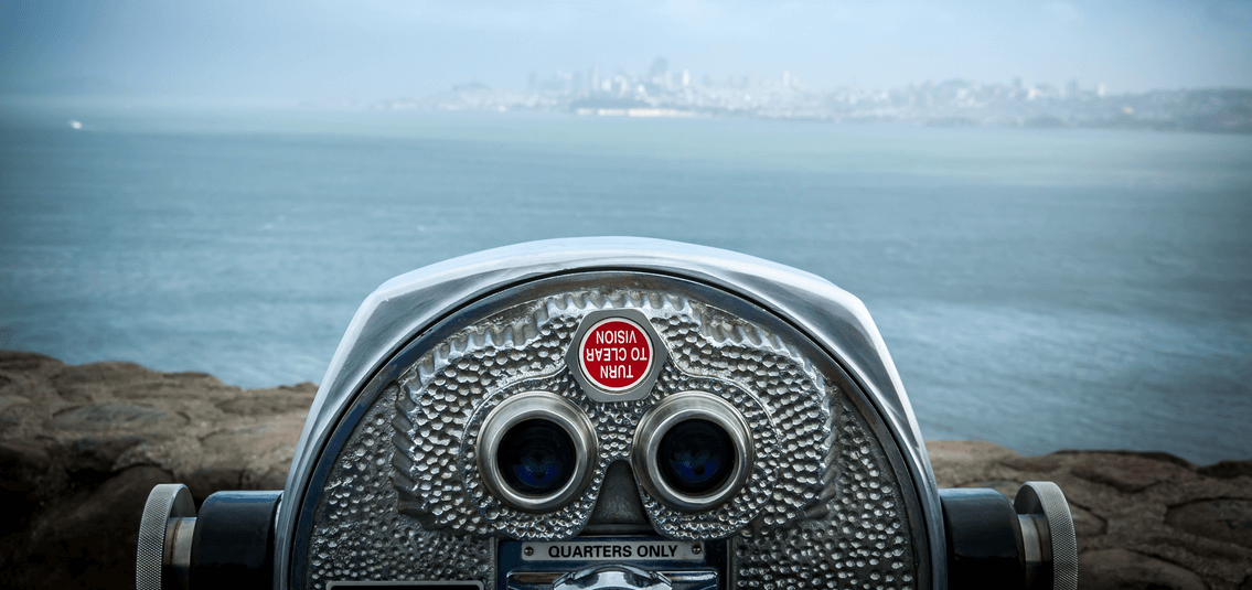 Stationary binnoculars on a promenade