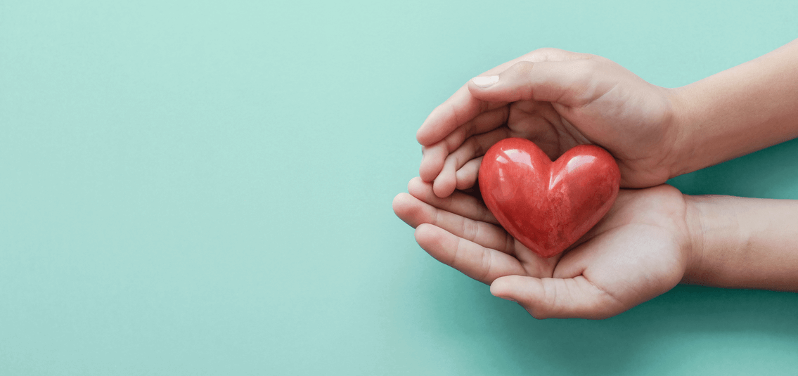 hands holding a love heart