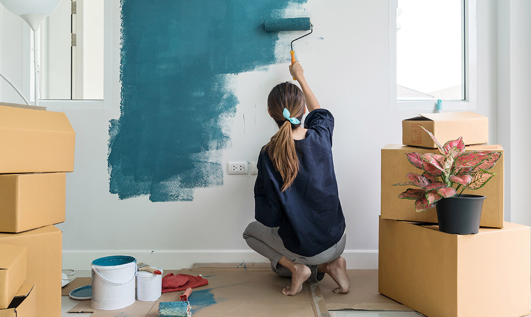 Woman making home improvements