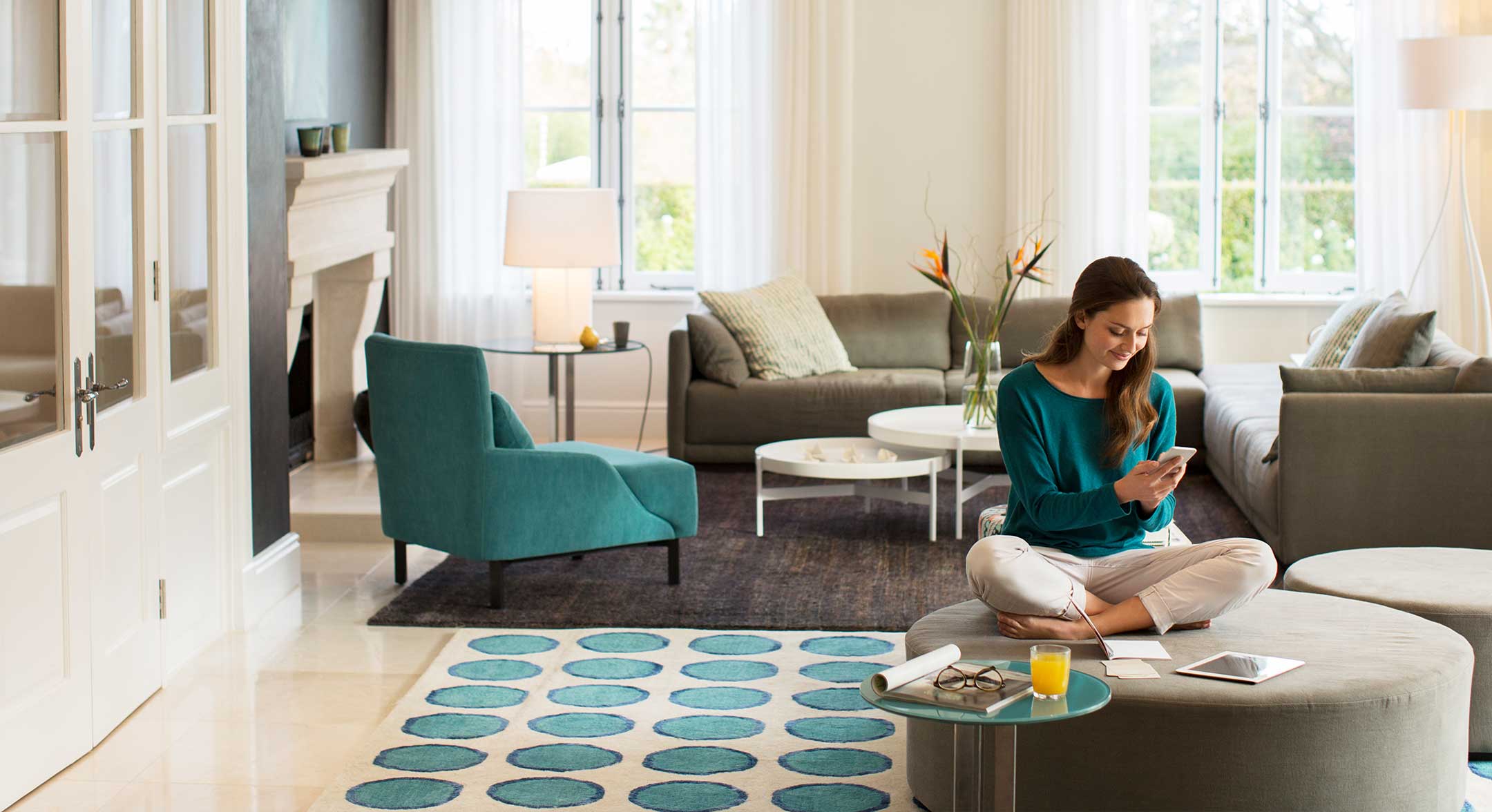 Woman sitting in living room